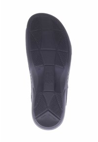 Black rubber shoe sole with textured surface. Features grooves for traction and a smooth heel. Size marked as 39.