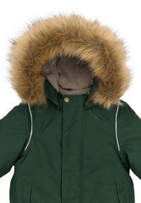 Green parka jacket featuring a brown faux fur-lined hood, snap button closures, and white accent piping along the edges. Cozy inner lining.