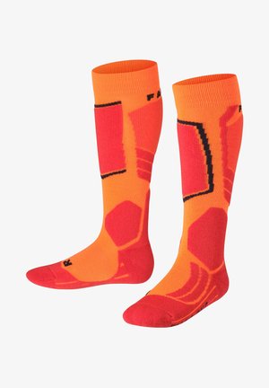 Calze fino al ginocchio con un vivace design arancione e rosso, caratterizzate da motivi geometrici e accenti neri per un tocco di dettaglio. Realizzate in un materiale morbido.