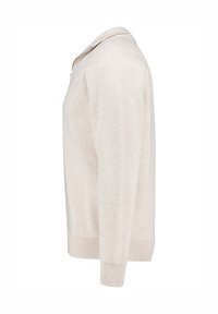 Beige cardigan, knit fabric, collared design, side view. Features ribbed cuffs and hem, smooth texture, and no visible patterns or accents.