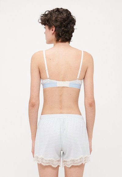 Blue and white striped shorts with lace trim and a matching bra featuring adjustable straps and a hook-and-eye closure at the back.