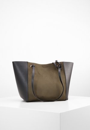 Tote bag with olive green suede center and black leather sides, featuring two black leather shoulder straps and gold-tone hardware rings.