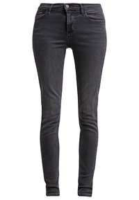 Svarta slim-fit jeans i denim, med en midjehöjd som är medelhög, femficksdesign och synlig sömnad vid sömmarna.