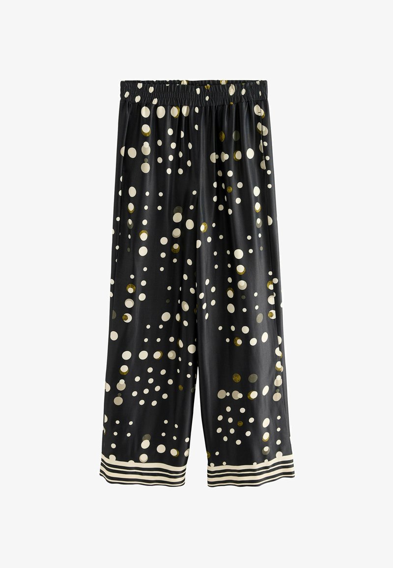 Black wide-leg pants with a soft satin finish, featuring large white and olive circular patterns, and a striped hem band at the bottom.