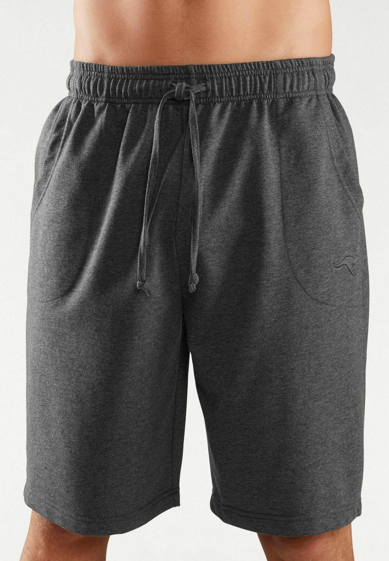 Gray athletic shorts with an elastic waistband and drawstring. Made from soft fabric, featuring side pockets and a subtle logo design.