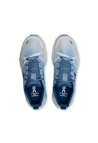Blue athletic shoes with a mesh upper, white accents, and waterproof features. Includes laces and logo on the side and sole.