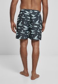 Urban Classics PATTERN - Fürdőnadrág - surfing t rex aop