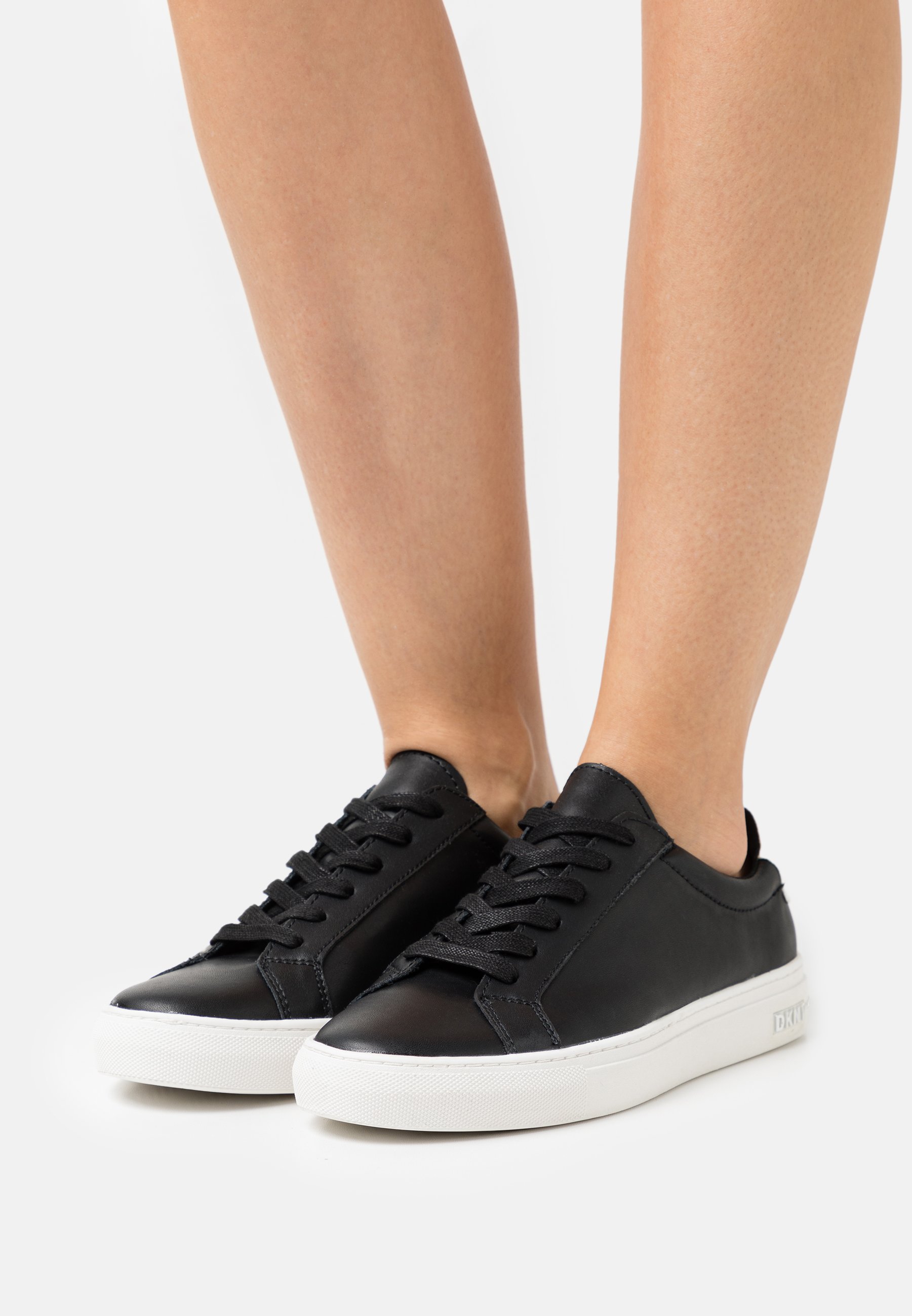 DKNY Bashi-slip Dames Sneakers in Zwart online kopen