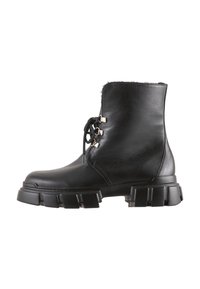 Black leather ankle boot with faux fur lining, rounded toe, lace-up design, and chunky platform sole with textured accents.