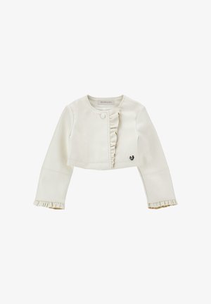 Chaqueta corta de color crema con ribete fruncido en el frente y los puños, cierre con un solo botón y pequeño adorno en forma de corazón.