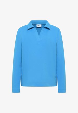 Modrý pulovr s dlouhými rukávy, výstřihem do V a měkkou texturou. Na spodním lemu je malá značka loga.