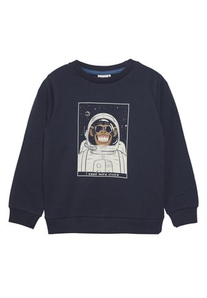 Sweat-shirt marine en coton avec un col rond, arborant un graphique d'un singe souriant dans un costume d'astronaute avec le texte "J'ai besoin de plus d'espace."