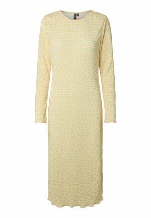 Obleka z dolgimi rokavi, dolžine do kolen, svetlo rumene barve, pletena z nežno rebrasto teksturo in valovitim robom, z okroglo izrezom in oprijeto silhueto.