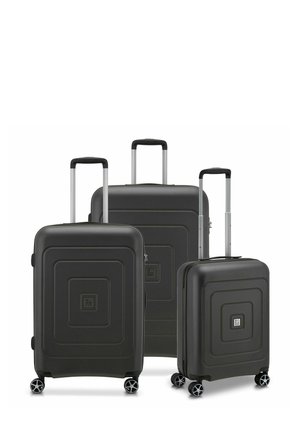 Three black hard-shell suitcases of varying sizes, featuring a textured square pattern, aluminum telescopic handles, and multi-directional wheels.