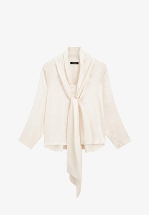 Biała, lekka bluzka z długimi rękawami i wiązaniem z przodu. Posiada drapowany kołnierz i fakturowaną tkaninę dla dodatkowego detalu.