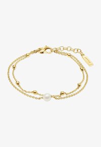 Selezionato, gulguld färgad