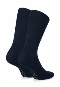 Granatowe skarpetki wykonane z gładkiej mieszanki bawełny, z prążkowanym ściągaczem i wzmocnioną piętą. Logo marki jest subtelnie nadrukowane na podeszwie.