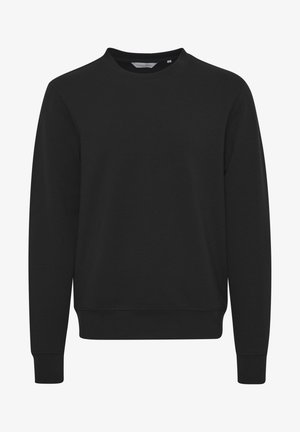 Sudadera negra de manga larga, con cuello redondo, puños y dobladillo acanalados. Fabricada en un tejido suave, presenta un detalle de costura mínima.