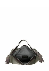 Sac à main en cuir marron avec une fermeture éclair, présentant une texture lisse et un intérieur spacieux gris, incluant une poche zippée supplémentaire.