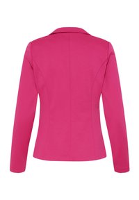 Veste ajustée rose vif à manches longues, coutures dessinant le dos, et col classique vue de dos sur fond blanc.