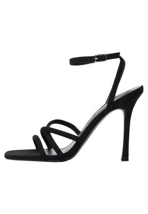 Black suede stiletto heel sandal featuring thin ankle strap, open toe design, and three curved straps across the foot. Simple and sleek silhouette.