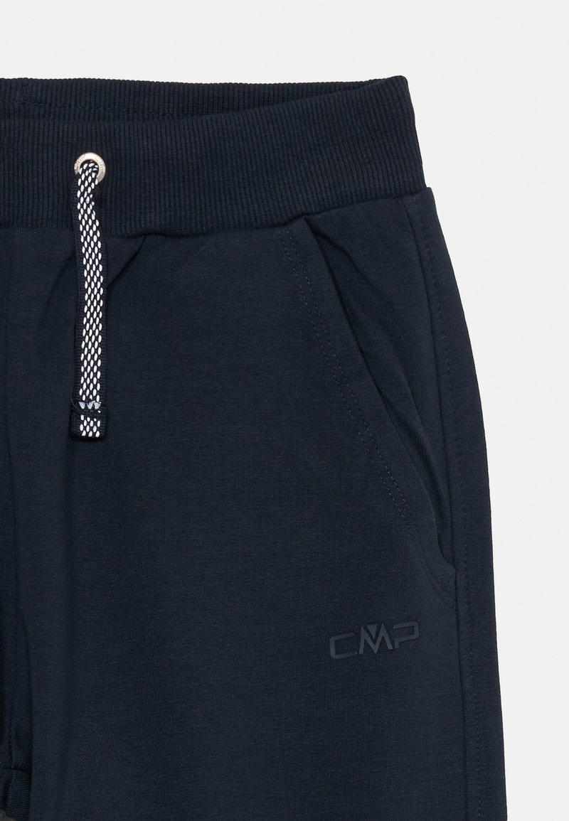 Pantaloni da jogging navy con vita a coste, coulisse, tasche laterali e discreto logo CMP. Tessuto morbido con una superficie liscia.