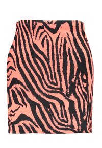 Falda lápiz corta en un vibrante color durazno con rayas negras de cebra, con una textura suave y diseño de talle alto.