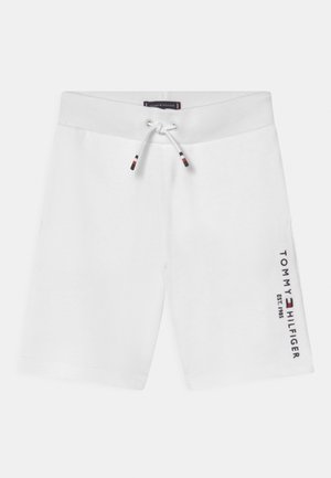 Hvide elastiske shorts med snøre, med teksten "Tommy Hilfiger EST. 1985" og logo på højre ben.