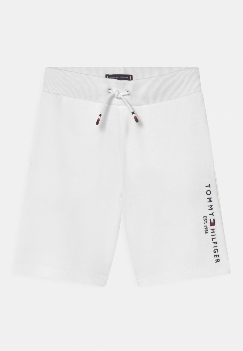Shorts blancs à taille élastique avec cordon, avec le texte et le logo "Tommy Hilfiger EST. 1985" sur la jambe droite.