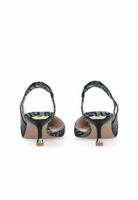 Sandales à talons hauts ouvertes à l'avant, noires et à motifs, avec fines brides cheville, petit talon métallique et empeigne en tissu texturé.