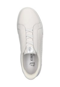 White leather sneaker with a smooth texture, featuring flat laces, padded collar, and a metallic logo patch on the tongue.