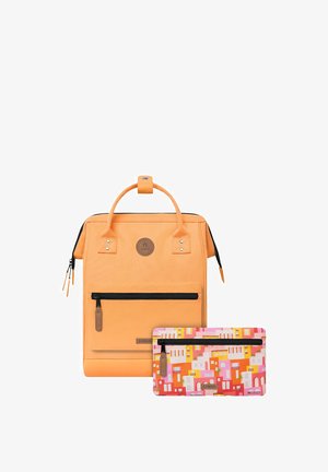 Orange fabric backpack with a top handle, zippered front pocket, and logo. Accompanied by a colorful patterned zip pouch.