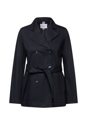 Navy blue double-breasted trench coat in a smooth fabric, featuring a belted waist and large buttons. Notable lapel collar design.