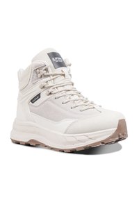 Béžové poloviční turistické boty s texturovaným svrškem, vyztuženou špičkou a gumovou podrážkou s hlubokým vzorkem pro lepší trakci. Logo na jazyku.