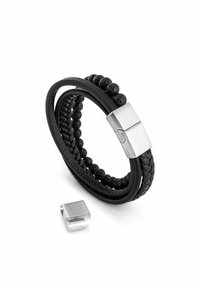 Black leather bracelet featuring braided and beaded designs, with a silver metal clasp. Includes an additional silver clasp detail.