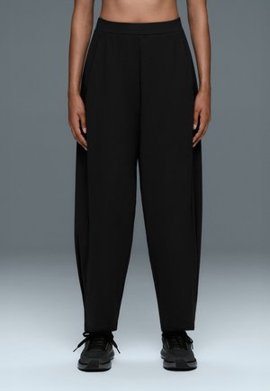 OYSHO, MID-RISE COMFORTLUX BALLOON TROUSERS - Trousers - black