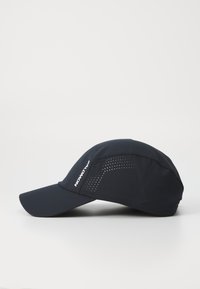 Black athletic cap with a curved brim, featuring a breathable design, perforated accents, and a logo on the side.