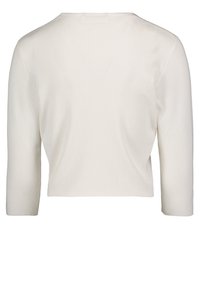 Off-white cropped trui met lange mouwen en een geribde structuur, vanuit de achterkant gezien.