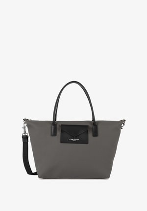 Sac fourre-tout en nylon gris avec des accents en cuir noir, présentant des poignées doubles, une bandoulière amovible, et une poche avant avec rabat.