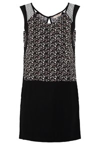 Robe noire sans manches avec un corsage à motif floral et un détail en dentelle aux épaules, avec une petite ouverture en forme de goutte au niveau du décolleté.