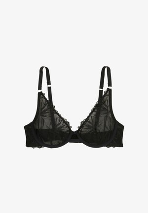 Soutien-gorge en dentelle noire avec des bonnets transparents à motifs floraux, bretelles réglables, soutien-gorge à armatures et bords festonnés le long du décolleté.