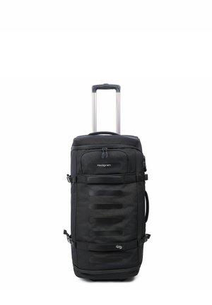 Valise à roulettes noire avec poignée extensible, plusieurs sangles avant, poches zippées et nom de la marque Hedgren sur un fond blanc uni.