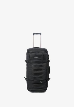 Valise à roulettes noire avec poignée extensible, plusieurs sangles avant, poches zippées et nom de la marque Hedgren sur un fond blanc uni.
