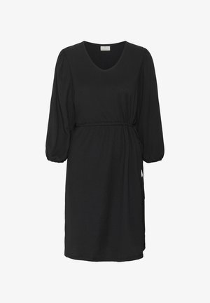 Melna kleita ar V veida kaklu, trīs ceturtdaļu pūka piedurknēm un elastīgu vidukli. Izgatavota no teksturēta auduma ar sānu sasienamām detaļām.