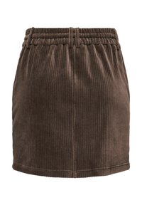 Gonna marrone in velluto a coste con vita elastica, caratterizzata da una texture a coste verticali e orlo dritto. Tessuto morbido al tatto.