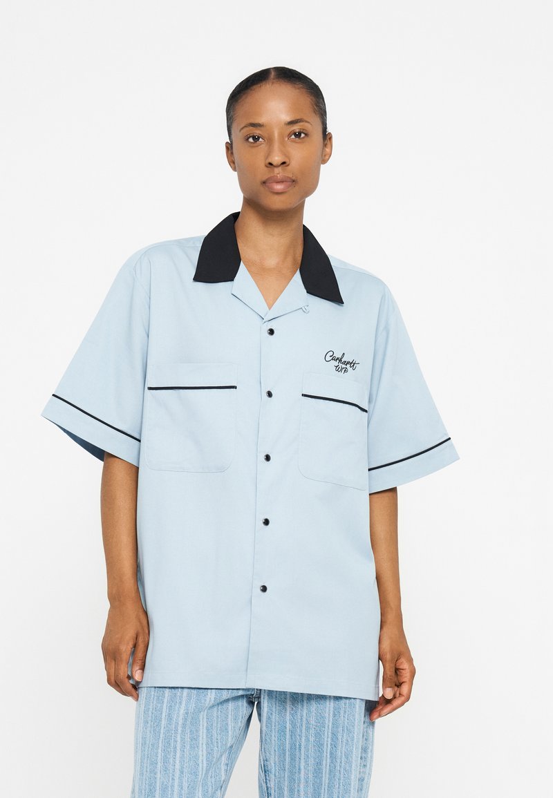 Camisa