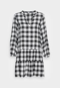 Vestido xadrez em preto e branco com mangas longas, decote em V e barra em camadas. Feito de um tecido leve com uma textura suave.