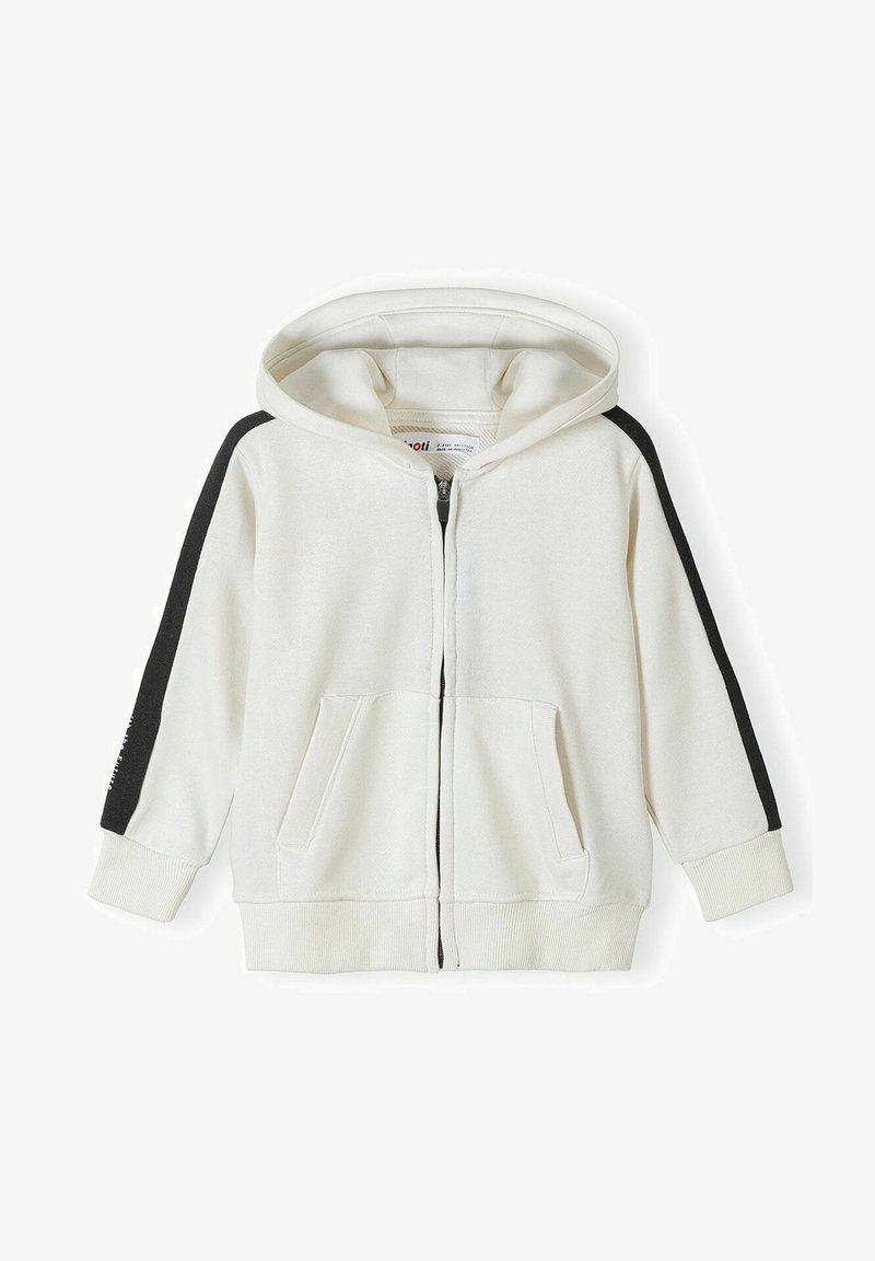 Ivory zip-up dukserica s crnim bočnim trakama, mekani materijal, dva prednja džepa, rebraste manžete i donji rub, te prostrana kapuljača.