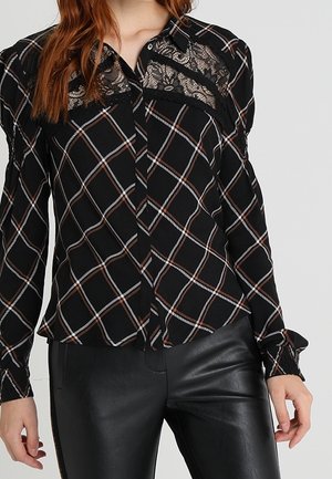 Blusa - black