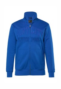 Sudadera azul royal con cremallera y cuello alto, con un gráfico texturizado que dice "PORT CITY LIVERPOOL" en el pecho y bolsillos delanteros.